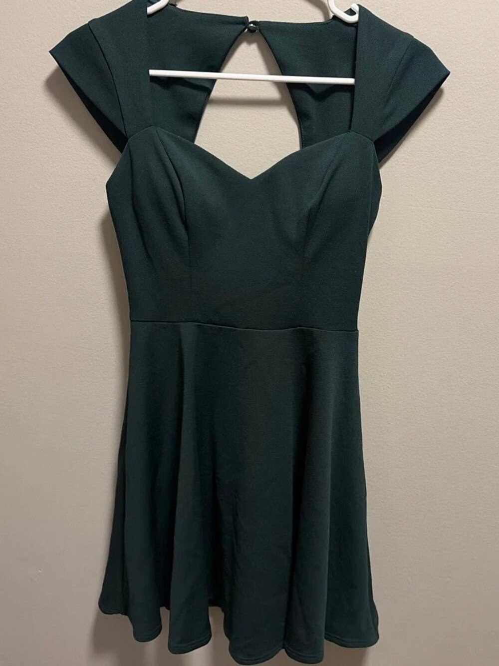 B. Darlin dark green sweetheart open back mini dress